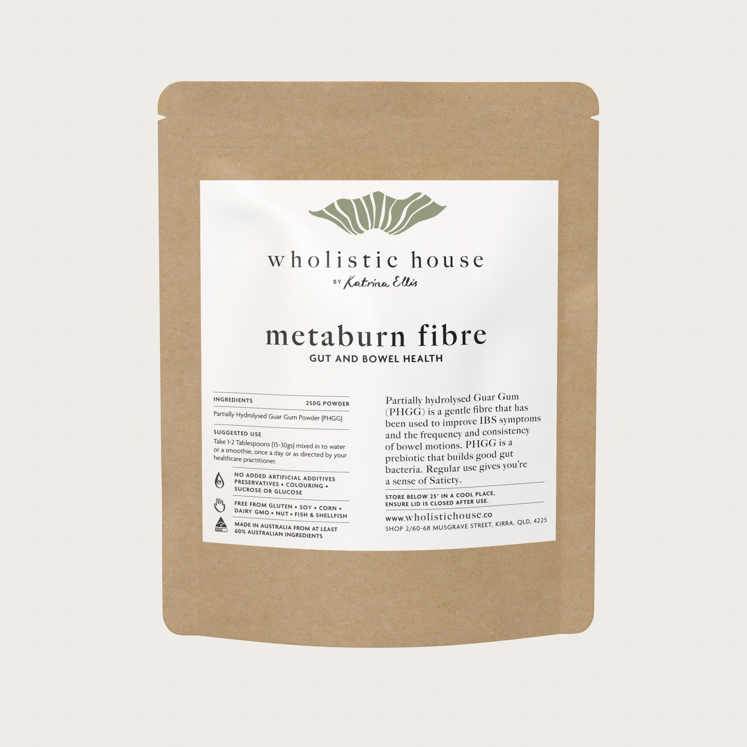 A pouch of Metaburn Fibre supplement with the brand label 'Wholistic House' and product name 'metaburn fibre' displayed on the front.